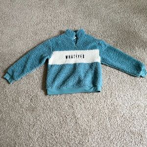Fluffy blue “whatever” half zip up jacket